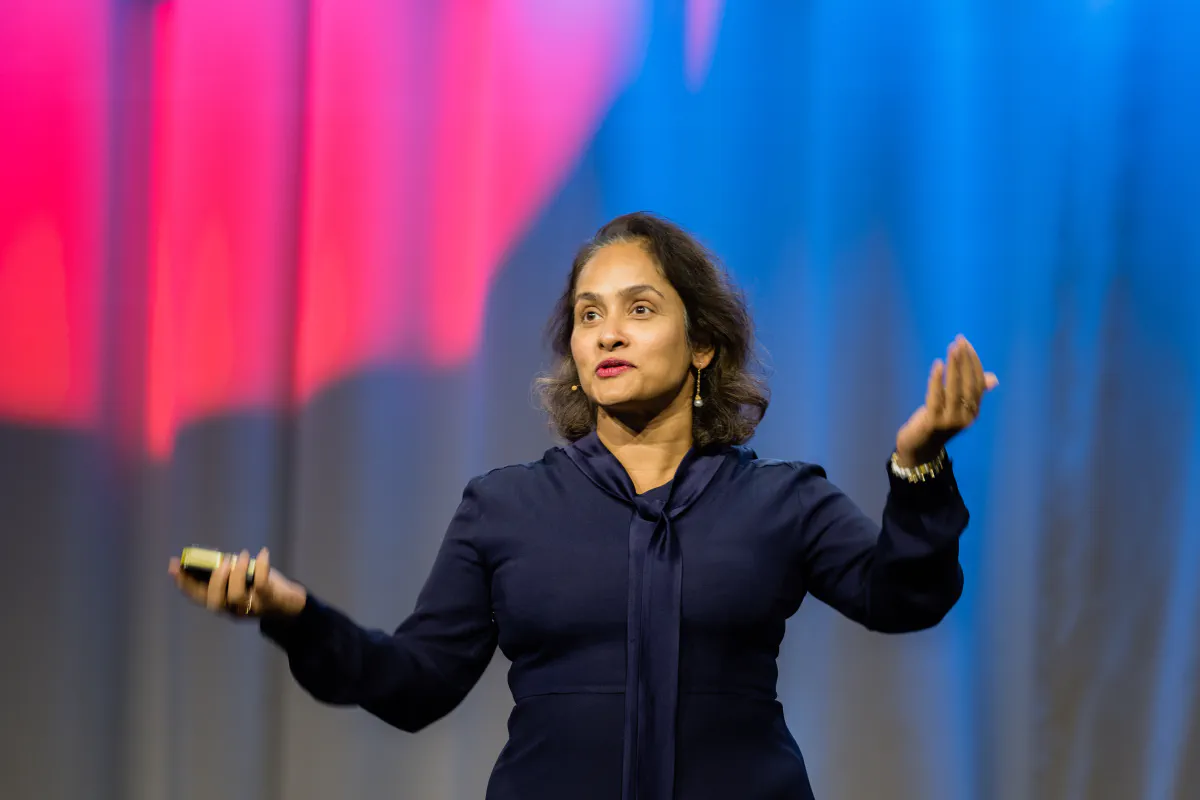 Speaker gesturing intensely.